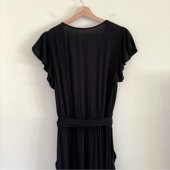 Free People Ruffle Your Feathers Deep V Flutter Sleeve Jumpsuit Black XS - Picture 9 of 13